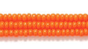 10SB134: CZ Seed Bead Opaque Orange 10/0