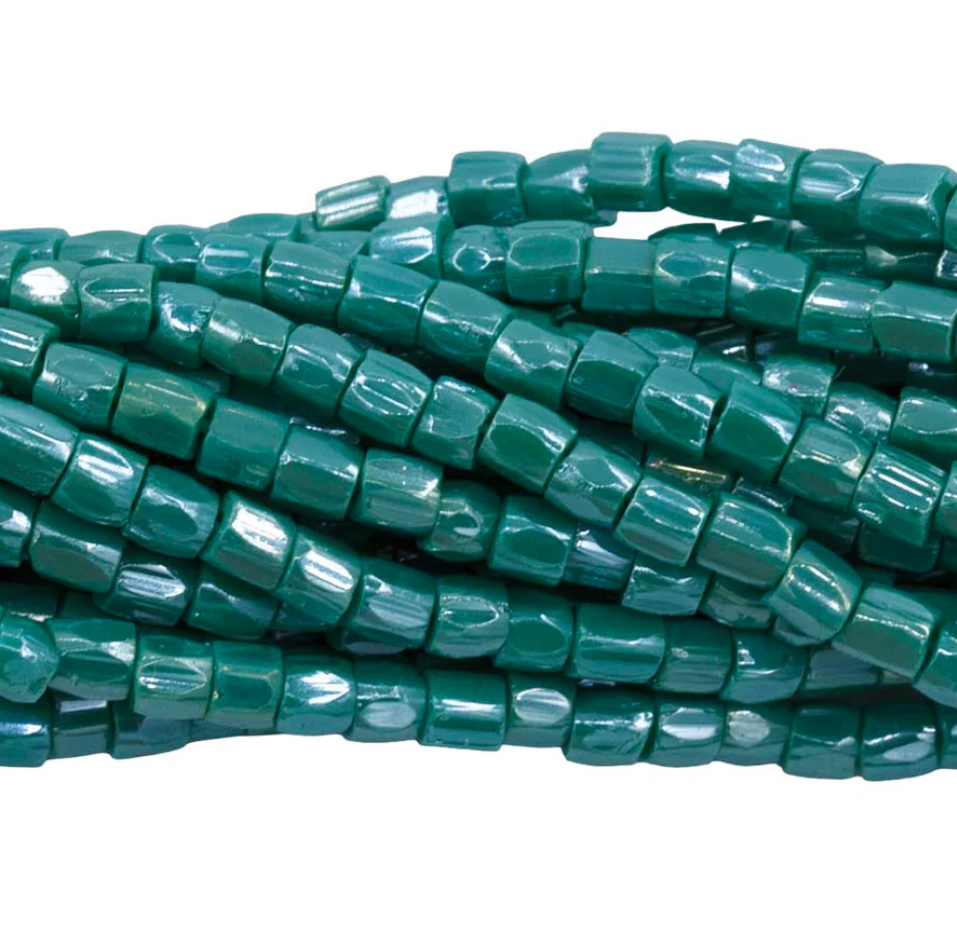 9SC384: CZ Seed Bead 3-cut Opaque Green Luster 9/0