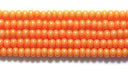11SB134-TA: CZ Seed Bead Terra Op Orange 11/0