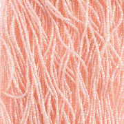 Czech Seed Beads 10/0 2Cut Transparent Light Pink Rainbow Strung