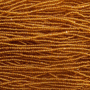 Czech Seed Bead 13/0 Cut Transparent Topaz Strung
