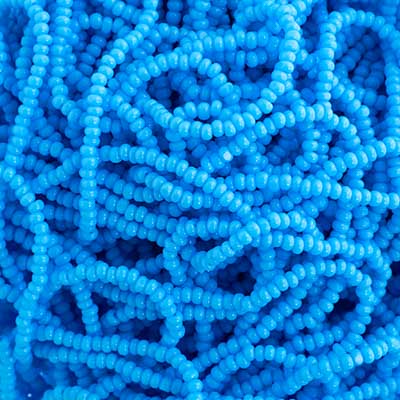 Czech Seed Bead 13/0 Cut Opaque Light Blue Strung