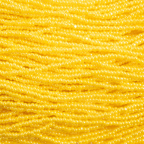Czech Seed Bead 13/0 Cut Yellow Luster Strung