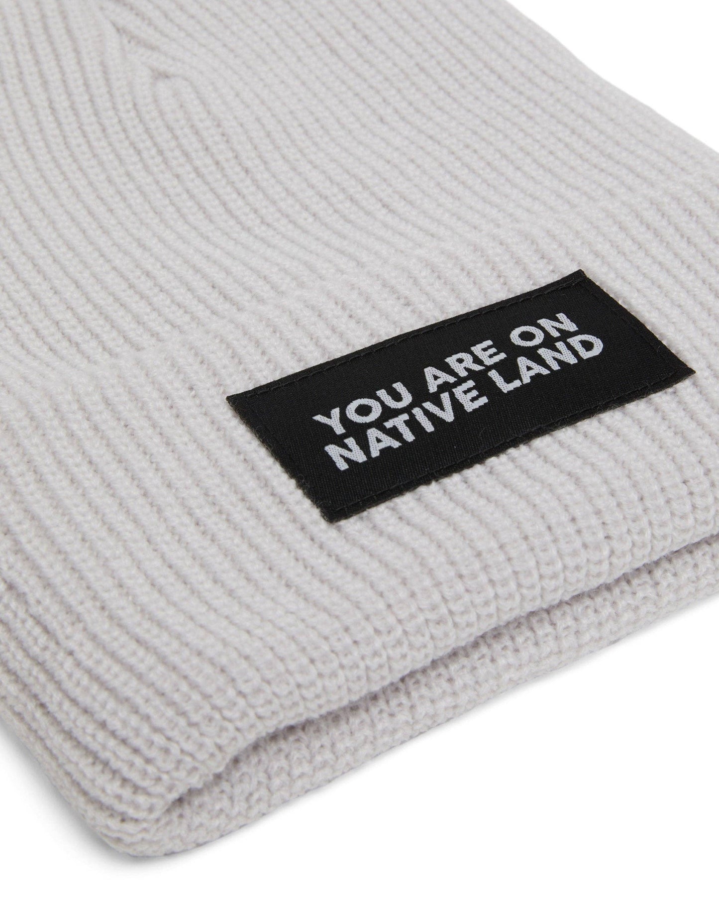 'YOU ARE ON NATIVE LAND' RIBBED BEANIE - GREY