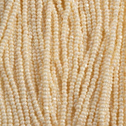 Czech Seed Bead 11/0 Cut Opaque Pearl Eggshell Strung