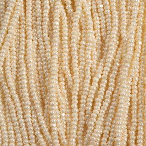 Czech Seed Bead 11/0 Cut Opaque Pearl Eeggshell Strung